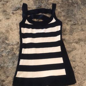 Navy blue & white sleeveless shirt.